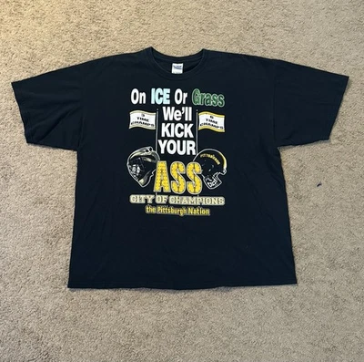 Camiseta Negra De Colección Pittsburgh Steelers Penguins Hombres 2X Campeones de Hielo o Hierba Foto 1 de 4