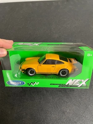 Porsche 911 Turbo 1974 modelo de coche diecast: escala 1/24, nuevo en caja de Welly Foto 1 de 3