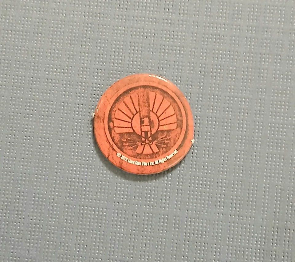 Juego The Hunger Games District 12 2012 pieza de repuesto - 1 ficha redonda NUEVO Foto 1 de 1