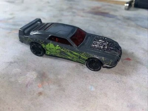 Hot Wheels Rivited Car with Skulls and Bones - Gray/Green - Picture 1 of 4
