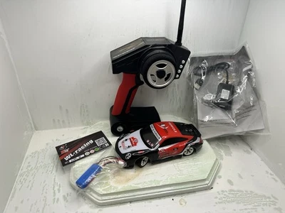 1:28 4WD 2.4G Mini RC Racing Car High Speed Off-Road Remote Control Drift Toys - Image 1 of 4