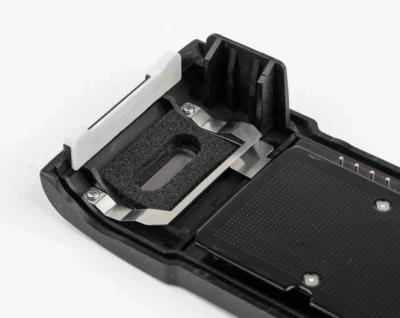 Nikon F100 Back Door Latch | Nikon Camera Replacement Part | Nikon F100 Repair - Image 1 of 4