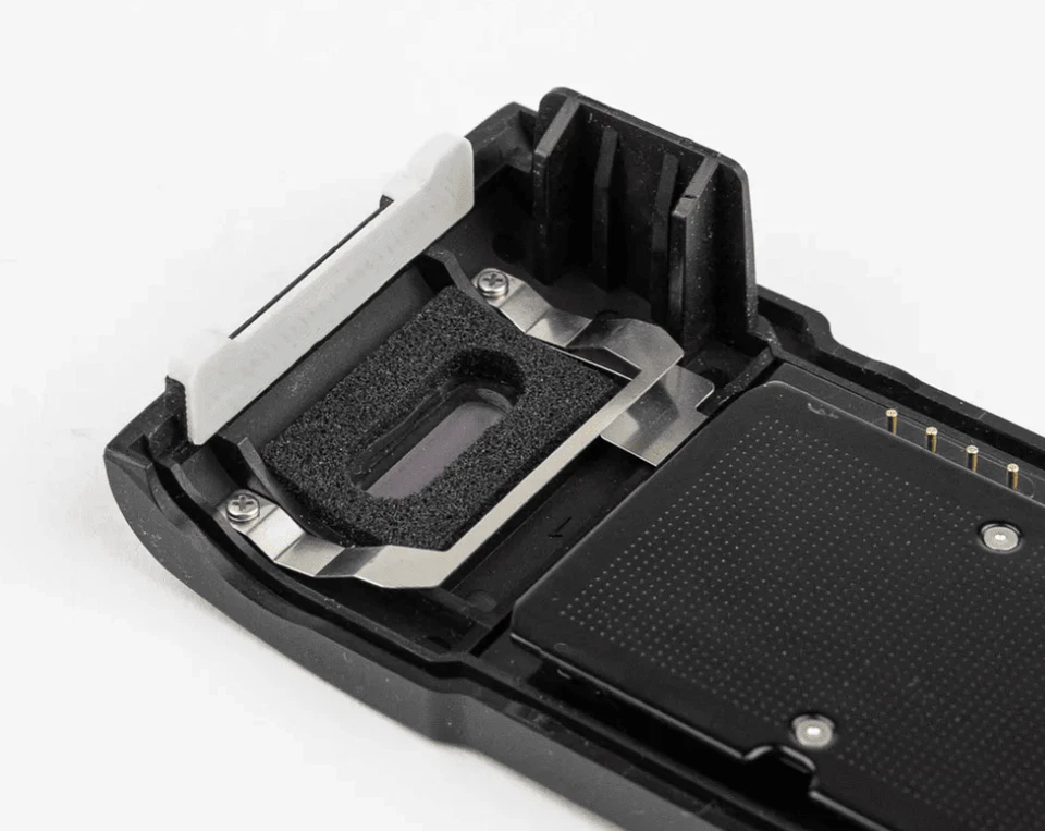 Nikon F100 Back Door Latch | Nikon Camera Replacement Part | Nikon F100 Repair - Image 1 of 4