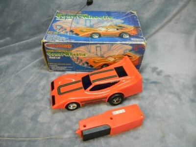VINTAGE 1978 REMCO GEORGE BARRIS DONUT WHEELIE ORANGE R/C STUNT CAR W/REMOTE - Image 1 of 4