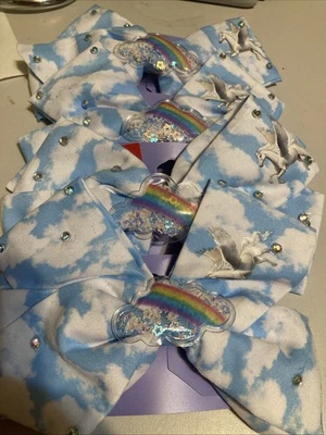 Lote de 4 nuevas pinzas para el cabello Claire’s grandes nubes arco iris unicornio Foto 1 de 4