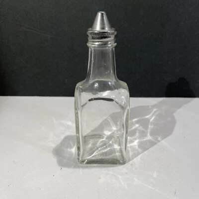 Botella transparente vintage de aceite y vinagre Gemco de 6" con tapa de metal plateado. Foto 1 de 2