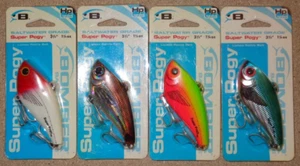 Lot 4 New Different Bomber Super Pogy HP Saltwater Lipless Rattle Fishing Lures - Picture 1 of 1