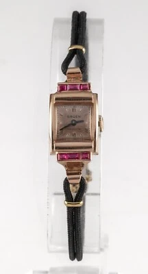 Reloj de precisión Gruen de oro rosa de 14k con rubí y correa de cordón de repuesto Foto 1 de 4