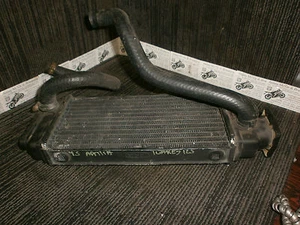 Radiador y rueda tapa Aprilia 125 Tuareg 1985-87 - Imagen 1 de 4