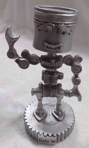 CHEVRON DELO KOLBENKOPF TEILE MANN WACKELKOPF STATUE FIGUR * KOSTENLOSER VERSAND - Bild 1 von 4