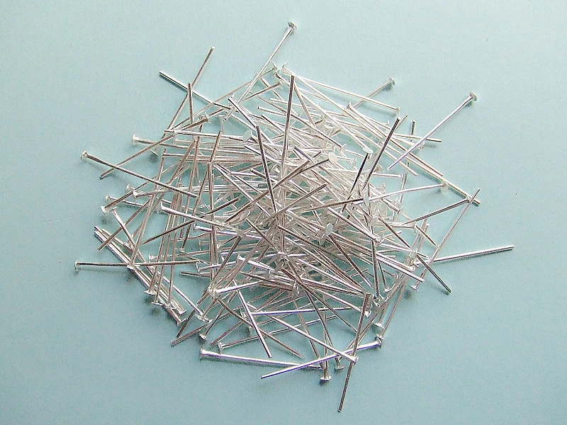 100pz spilli  AT 26x0,7mm colore argento chiaro bigiotteria - Immagine 1 di 1