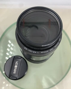 Minolta AF tele zoom 100-300mm 1:4.5-5.6 SLR CAMERA LENS BLACK TESTED - 333 - Picture 1 of 6