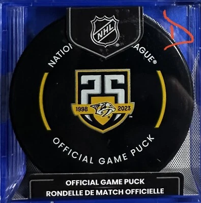 23-24 Nashville Predators Official Game Puck (25 Yr Anniversary) (No Trackers) - Image 1 of 2