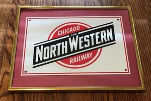 12" x 8" CHICAGO & NORTHWESTERN RAILROAD ADV. SCHILD SCHWER GESTANZT METALL GERAHMT - Bild 1 von 2
