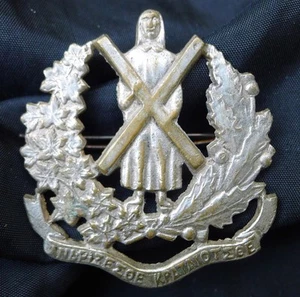 WW1 CANADIAN HAT BADGE: SAINT ANDREWS COLLEGE CADETS. CAST WHITE METAL, LUGGED. - Imagen 1 de 10