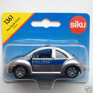 Siku 1361 VW New Beetle Polizei - silver/blue - Picture 1 of 1