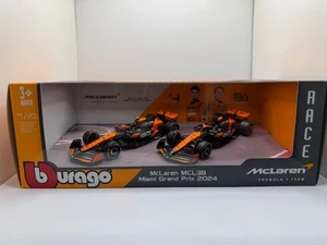 BBurago 2 X F1 McLaren MCL38 Set Norris & Piastri - Miami 2024 Scale 1/43 - Picture 1 of 5