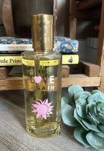 In Love Again Edition Fleur De La Passion Yves Saint Laurent 95% full RARE