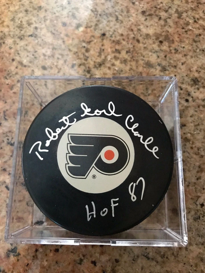 BOBBY CLARKE AUTOGRAFIADO PHILADELPHIA FLYERS DISCO FIRMADO ROBERT EARLE CON CERTIFICADO DE AUTENTICIDAD  Foto 1 de 1