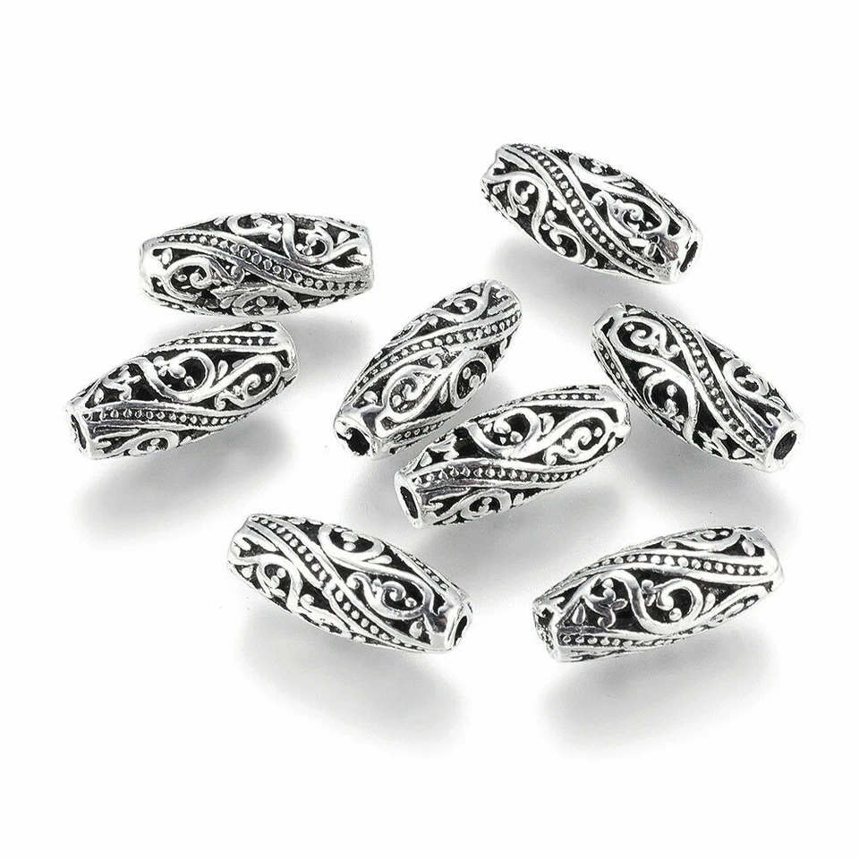 10pcs Tibetan Silver Alloy Metal Beads Filigree Oval Loose Spacer Beading 17x7mm - Image 1 of 2