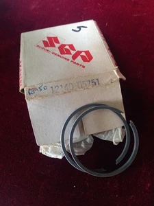 Nuevo juego de anillos de pistón de gran tamaño genuino Suzuki RM50 0,5 mm RM50 12140-05751 - Imagen 1 de 1