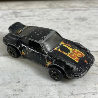 De colección 1974 Hot Wheels Porsche P-911 negro #95 Malasia rayas de carreras Foto 1 de 4