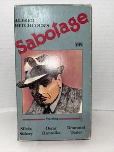 ALFRED HITCHCOCK'S SABOTAGE OSCAR HOMOLKA VHS 1986 SOFT CASE - Foto 1 di 6