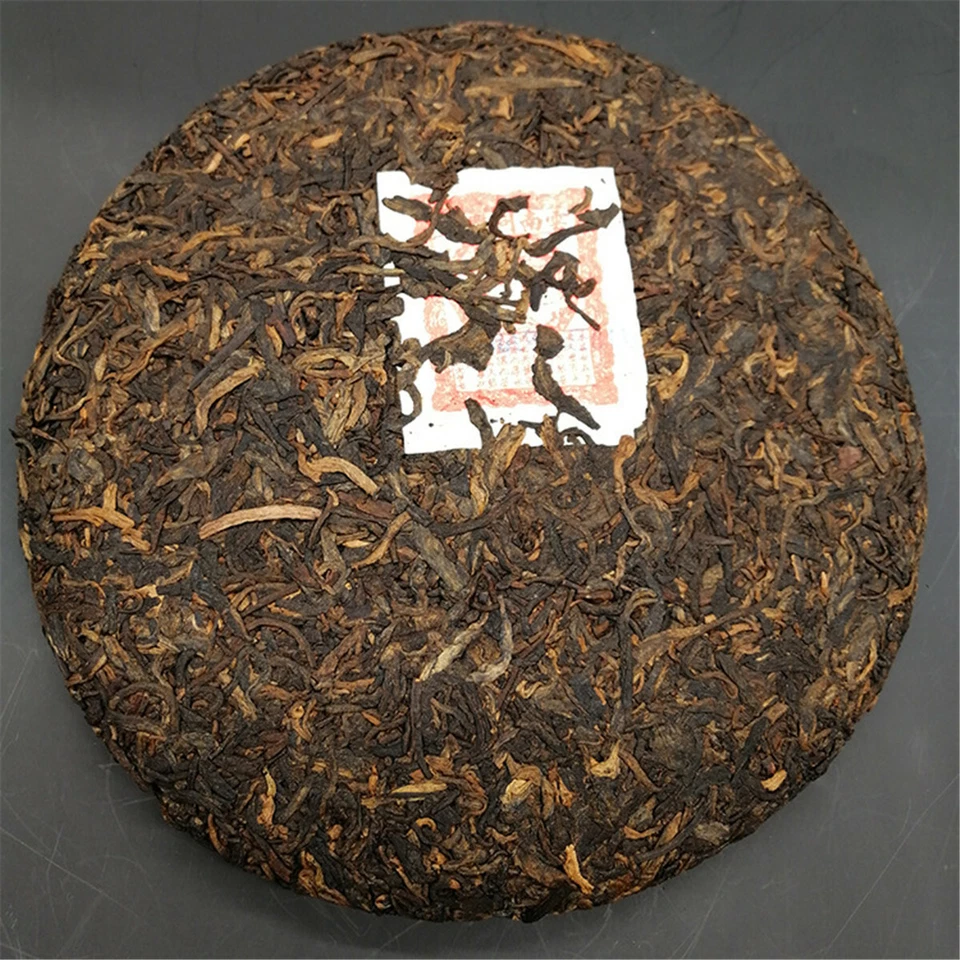 Antiguo pastel de té chino Pu Erh Yunnan orgánico viejo maduro Puer 357 g té puerh cocido Foto 1 de 4
