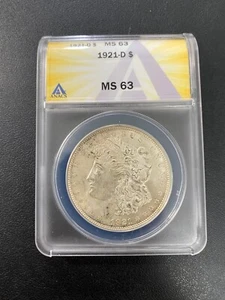 1921 D MORGAN DOLLAR  ANACS MS-63 - UNCIRCULATED - BETTER DATE - CERTIFIED - $1 - Picture 1 of 2