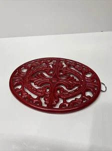 Cast Iron Trivet Oval Footed Red Enameled Metal Hot Plate Ornate Farmhouse - Picture 1 of 3
