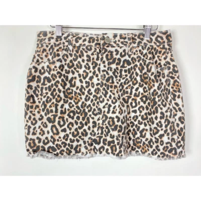 Falda corta de mezclilla Justice Girls marrón con bolsillos de leopardo dobladillo crudo elástico cremallera recta 20 Foto 1 de 4