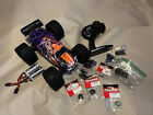 Highly Upgraded traxxas e revo 1/16 vxl brushless Plus 2-2s Batteries and Parts