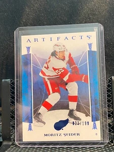 Moritz Seider 2022-23 Artifacts - Royal Blue #23/199 #62- Red Wings - Picture 1 of 2