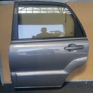 KIA SPORTAGE LEFT REAR DOOR KM, W/ MOULD TYPE, 08/04-06/10 04 05 06 07 08 09 10 - Picture 1 of 3