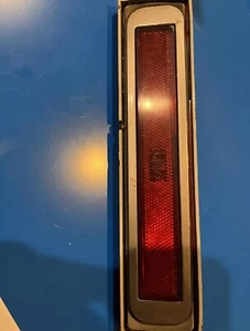 1984-1992 LINCOLN MARK VII REAR SIDE MARKER LIGHT BEZEL LH Dark Silver - Picture 1 of 4