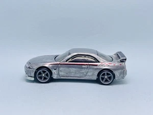 Defekt Hotwheels Zamac Nismo Festival 2025# Nissan Skyline GTR R33 ungesponnen lose - Bild 1 von 6