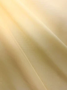 Tela para cortinas de poliéster de velo transparente crema (118 in) Vendido BTY - Imagen 1 de 1