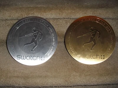 RELOJ MUESTRA ATLANTA OLIMPICS 1996 MEDALLONES ORO PLATA PIEZAS DE VENTA RARO Foto 1 de 4