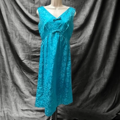 1960’s Empire Waist Teal Blue Chinese Floral Brocade Sleeveless Dress With Bows - Image 1 of 4