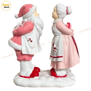 Pink Santa & Mrs Claus Kissing Figurine Candy Cane Aprons Resin Christmas Decor - Picture 1 of 12