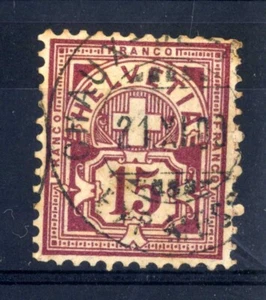 SWITZERLAND - SWITZER 1882-1899 15c. Figure topped by a cross on paper. - Picture 1 of 1