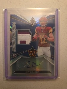 Luke McCAFFREY 2024 Panini Phoenix Rookie Phenom Patch Autograph BLUE Prizm /49 - Bild 1 von 3