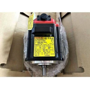 Ein FANUC AC Servo Motor A06B-0061-B203 - Bild 1 von 3