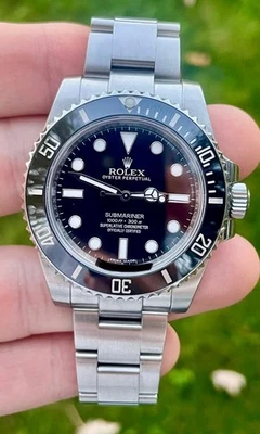 Rolex Submariner 114060 Tarjeta de Servicio, Estuche y Caja, Esfera Negra Foto 1 de 4