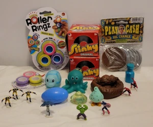 Mixed Toy Lot ~ Slinky, Silly Putty, Roller Ringz, Super Heros, Toy Lot (A-2) - Picture 1 of 14