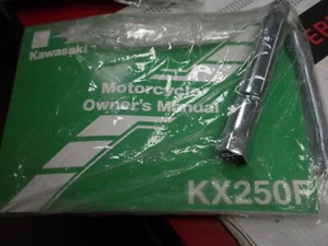2006 Kawasaki KX250F Owner's manual with spoke wrench and spark plug wrench - Picture 1 of 1