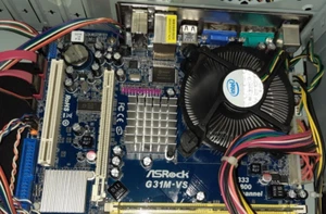 Placa madre ASRock G31M-VS REV:G/A 1.02 con CPU Celeron de 1.8 Ghz, enfriador y ventilador - Imagen 1 de 13