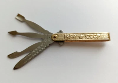 Cuchillo de colección para clavos cuchillo de bolsillo soviético manicura plegable cohete URSS 1959 Foto 1 de 4
