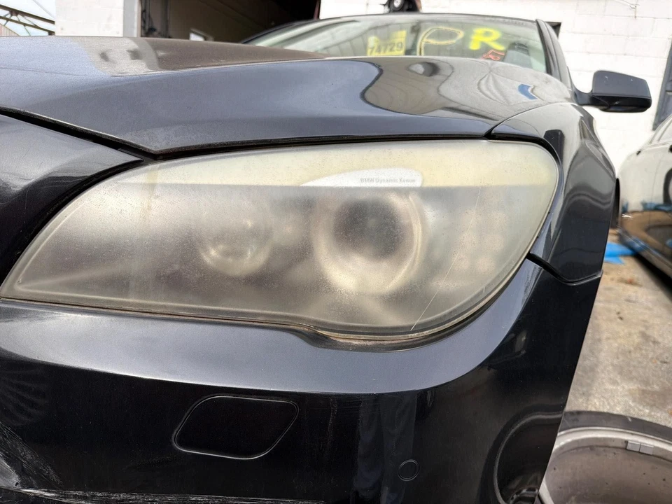 Левая фара в сборе для BMW 750I 09–12 годов (ксеноновые скрытые адаптивные фары) левая - Изображение 1 из 1