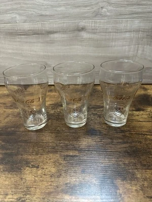 Conjunto de 3 copos de Coca-Cola 12 oz saudação aos Jogos Olímpicos de 1976 línguas mundiais - Imagem 1 de 4